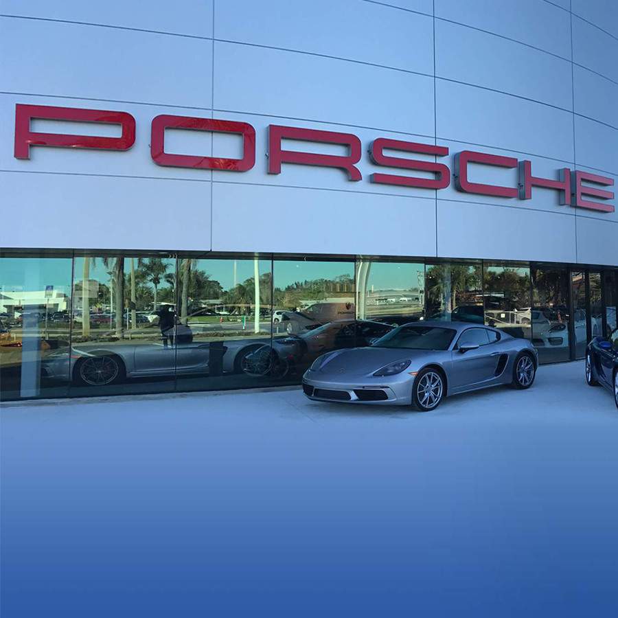 [caption: Porsche</br / />Dealership] Porsche Dealership